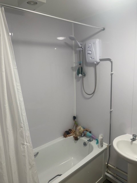 Mrs L's bathroom after repairs completed